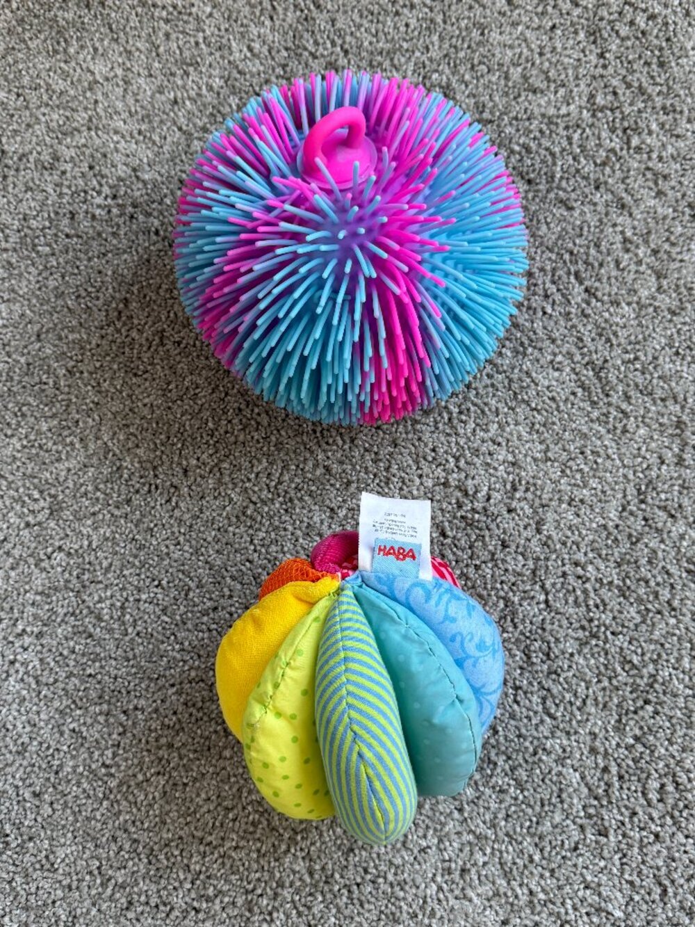 2 Balls designed for sensory development in infants and toddlers. 5” and 7”